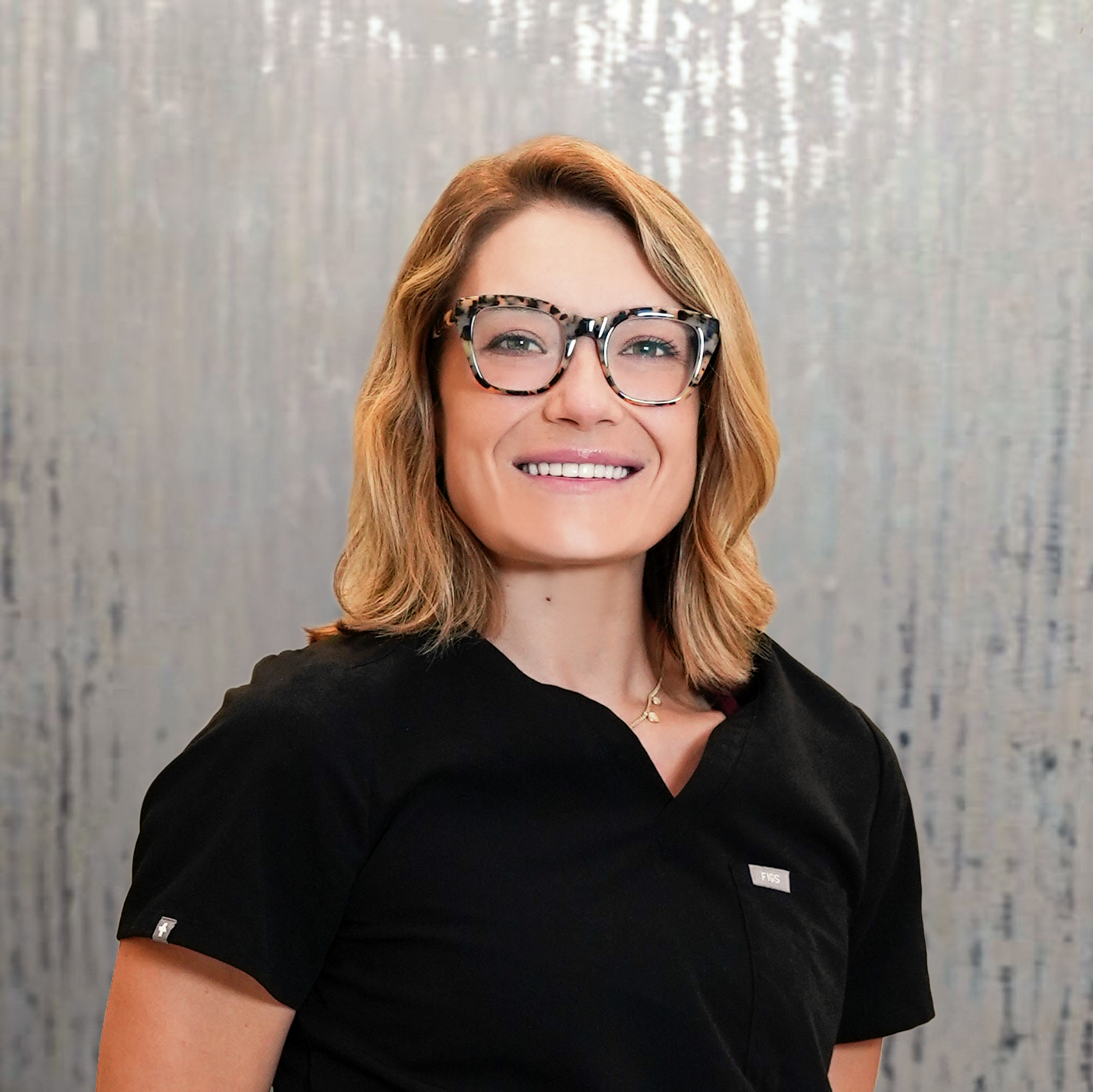 Professional headshot of Allie Slowik, PA-C, Board-Certified Physician Assistant at Advanced Institute for Plastic Surgery in Temecula, CA.