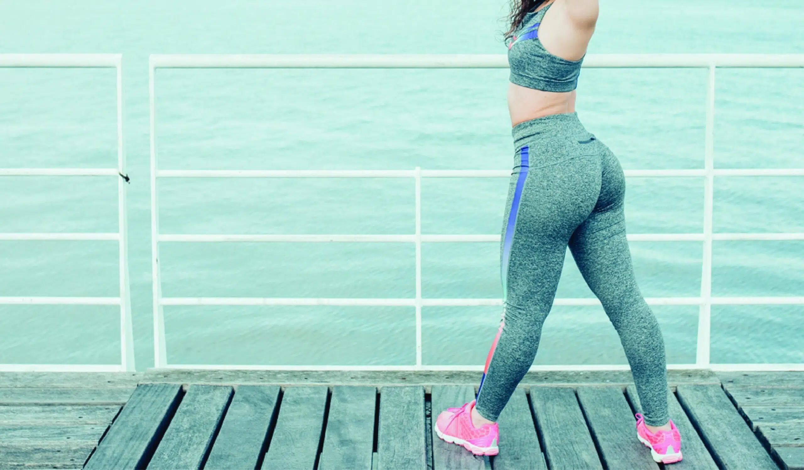 woman wearing yoga pants, showcasing the results of a Brazilian Butt Lift (BBL) procedure for a more sculpted and contoured buttocks