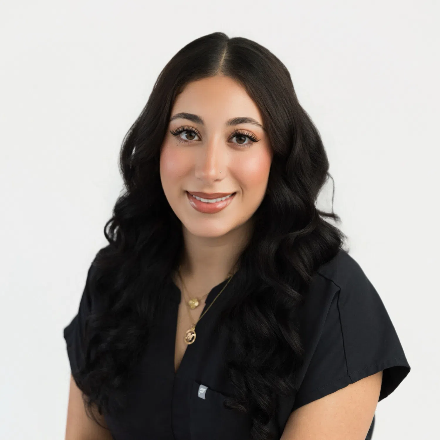 Nurse injector Marianne Atieh, RN specializes in Botox, filler, and facial balancing for natural, refreshed results. Book with Bloom in Temecula today.